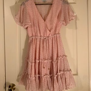 Pink dress with sleeves and drawstring. Never worn